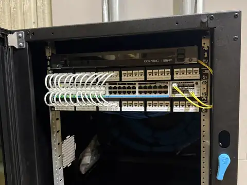 Wall-mount cabinet with patch panel