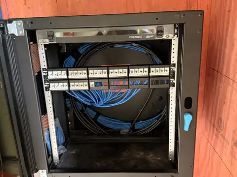 Wall-mount network cabinet with cabling
